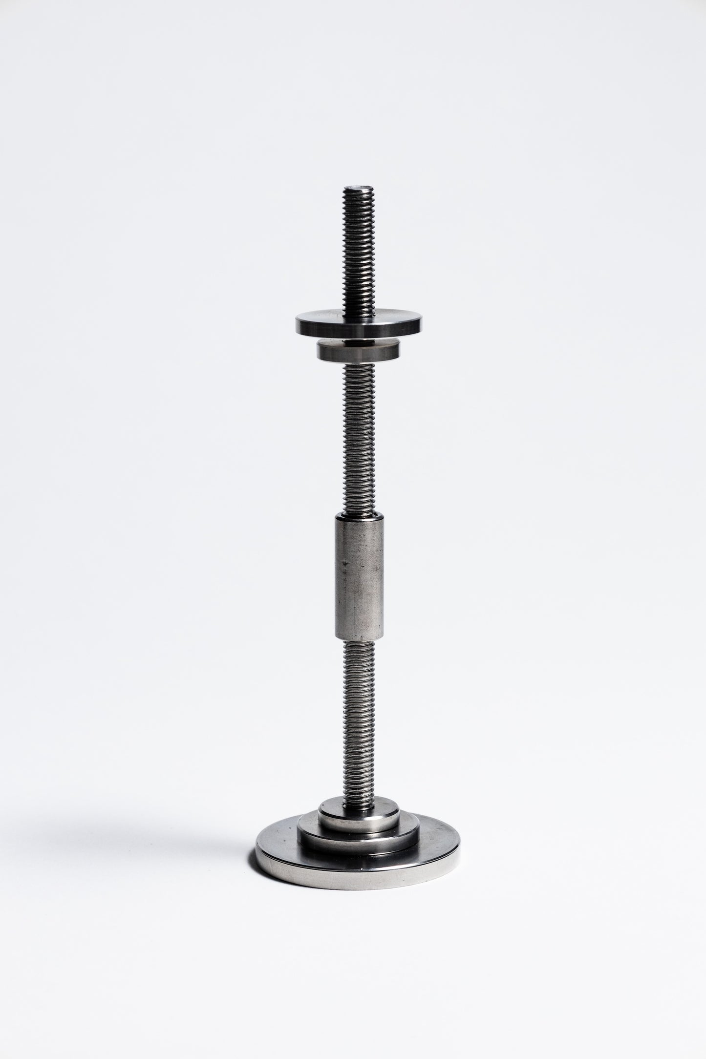 Metal adjustable stand on a white background