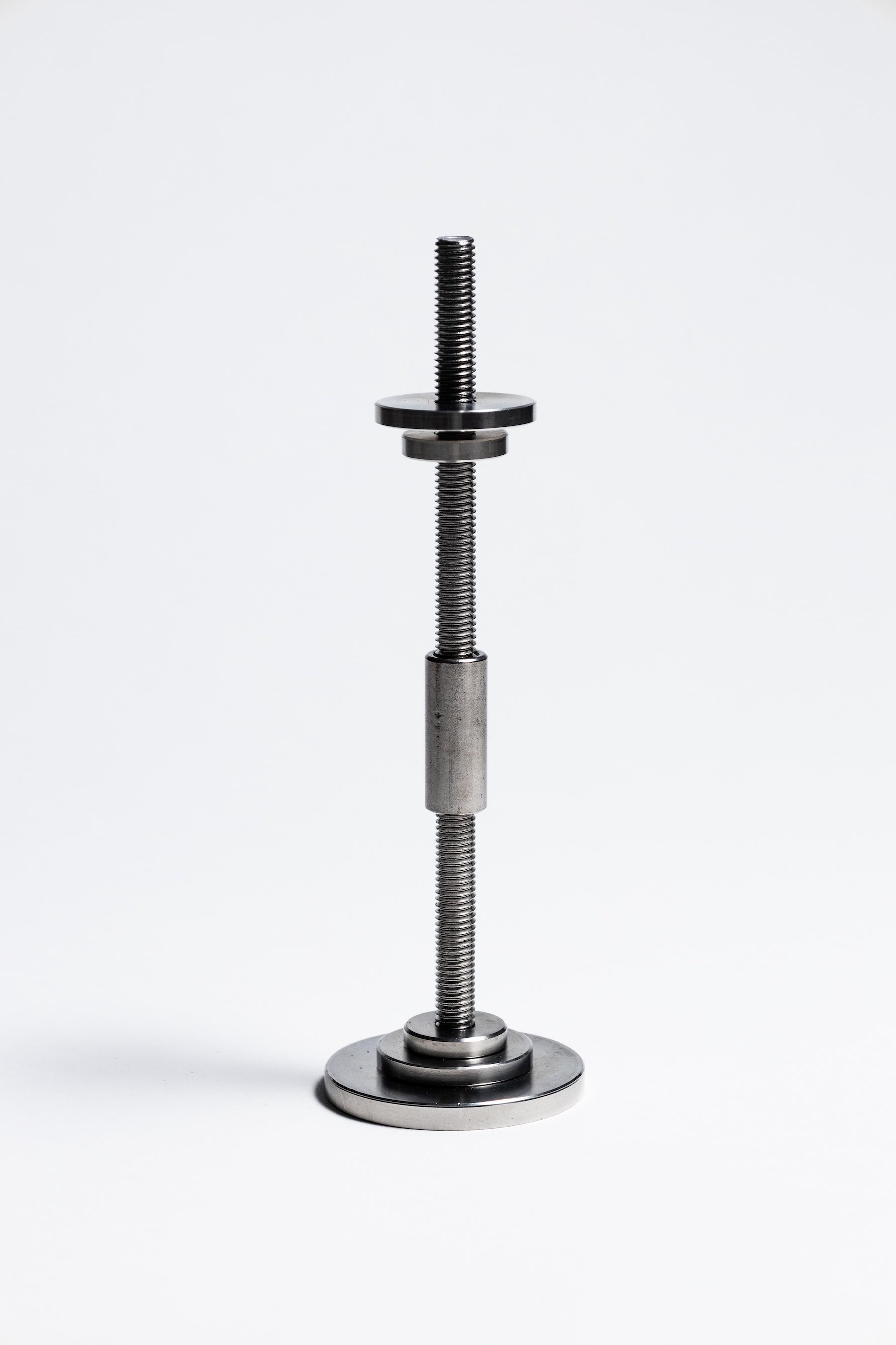 Metal adjustable stand on a white background