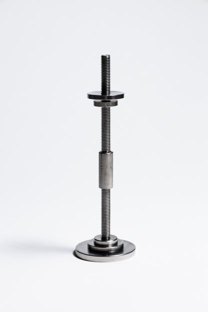 Metal adjustable stand on a white background