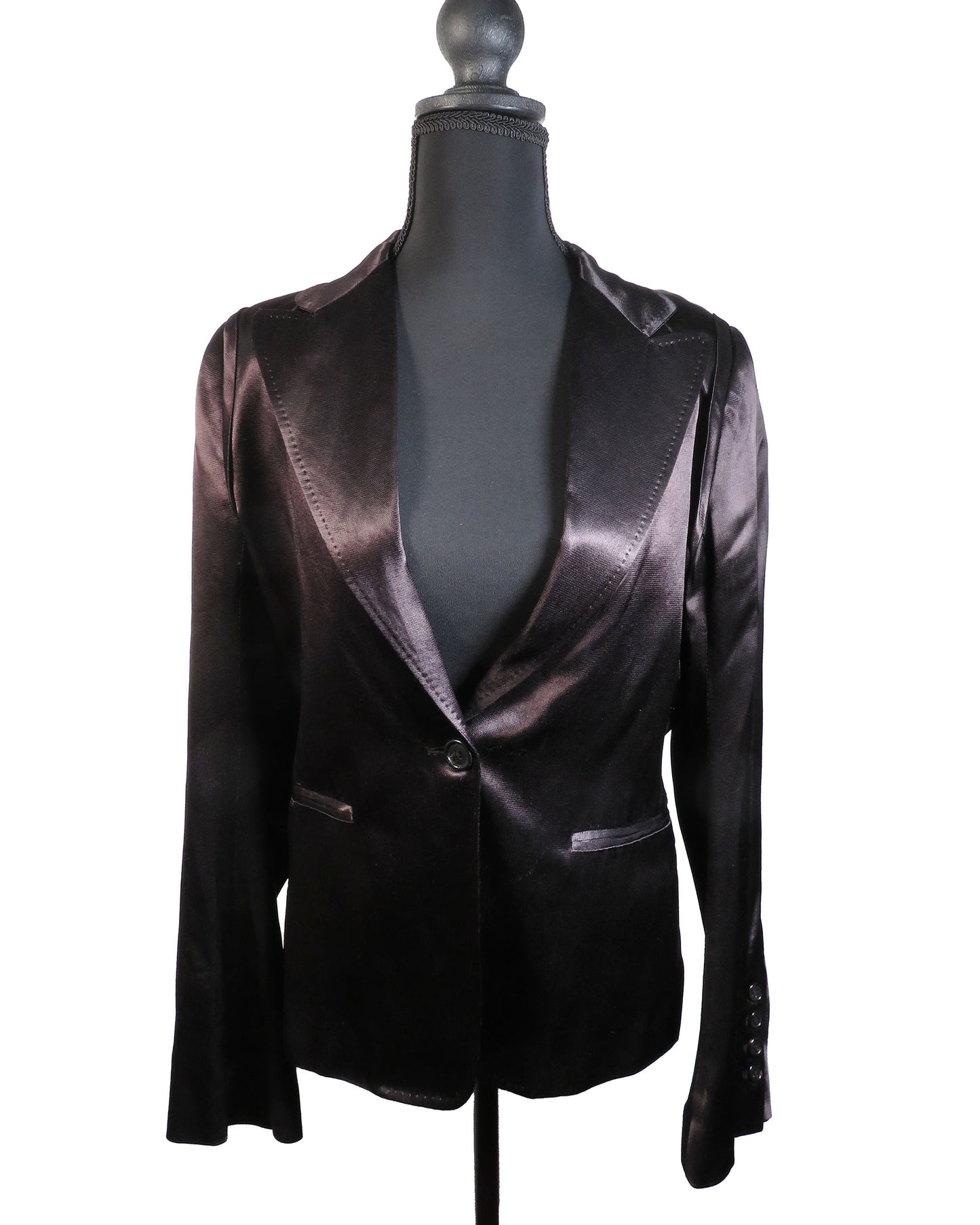 Black satin blazer on a mannequin against a white background