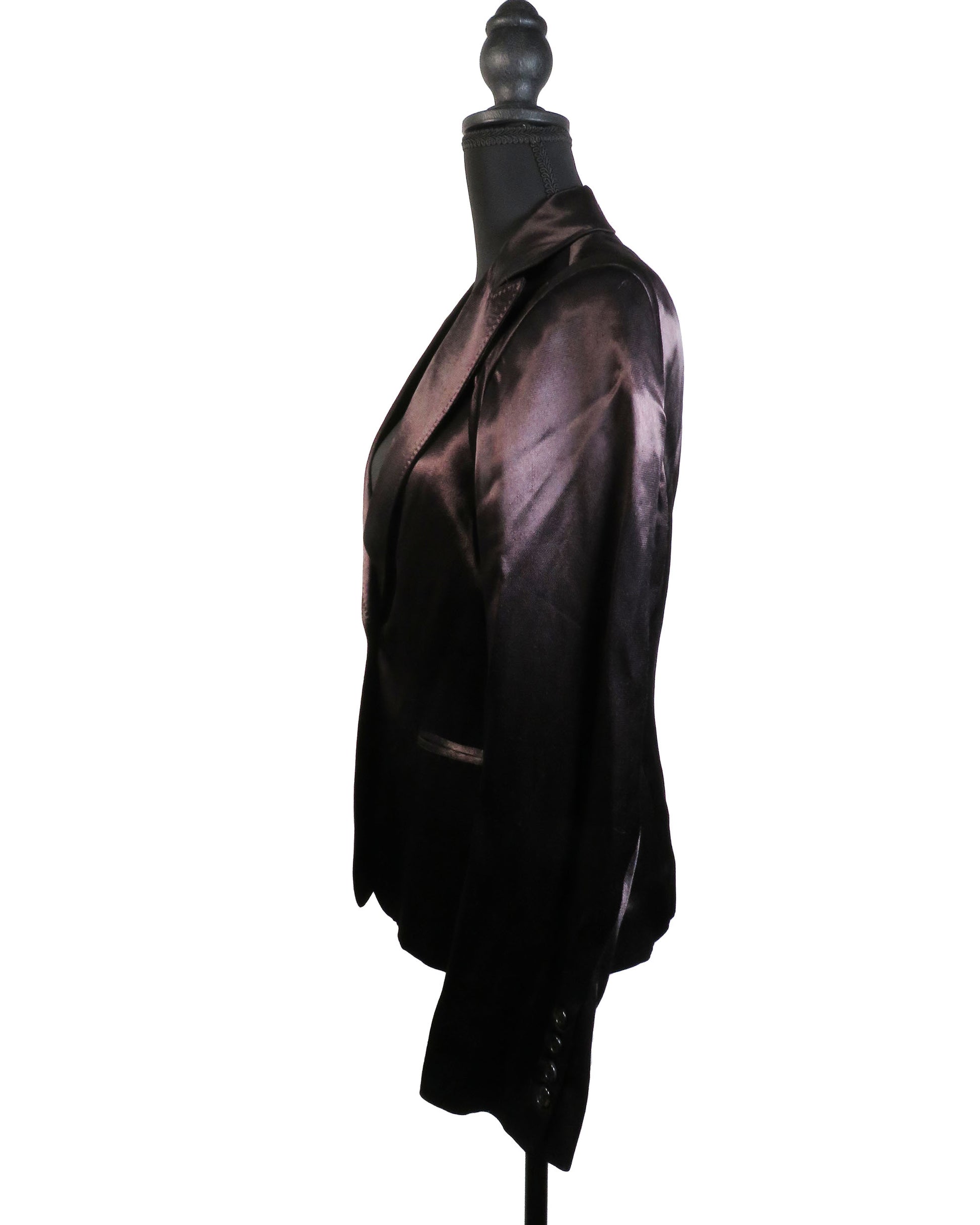 Black satin jacket on a mannequin against a white background