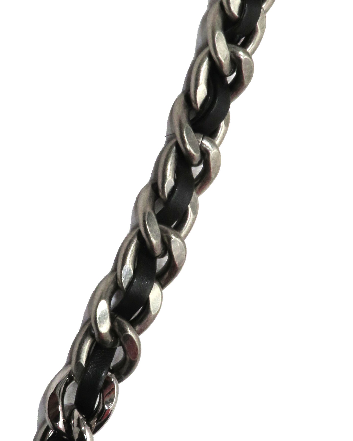 Close-up of a braided metal chain on a white background