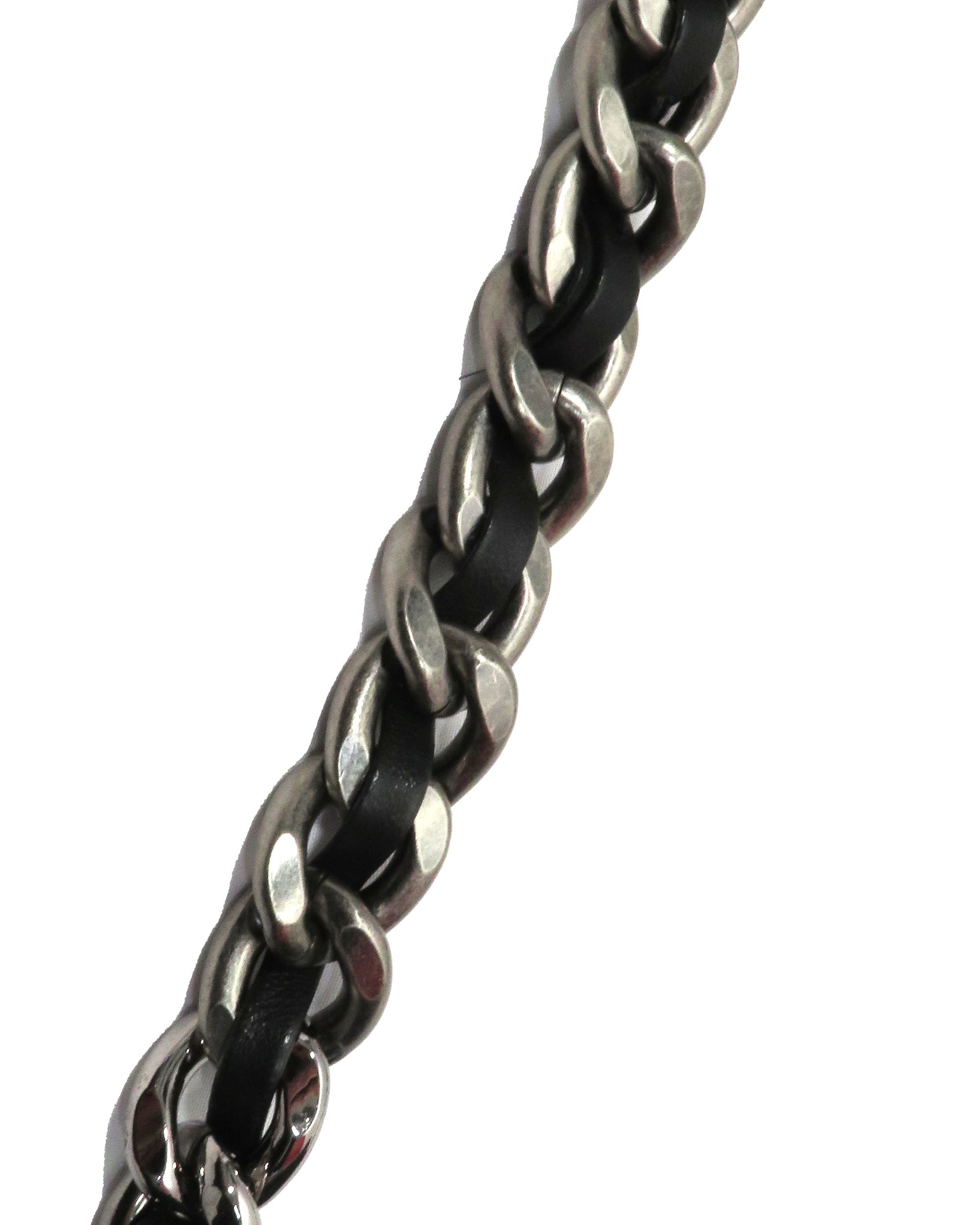 Close-up of a braided metal chain on a white background