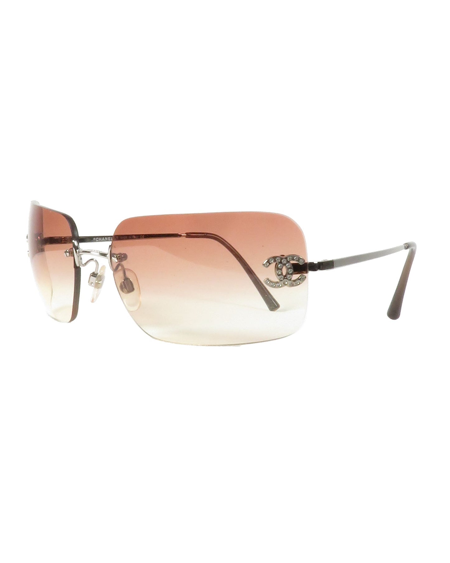 Sunglasses with gradient lenses on a white background