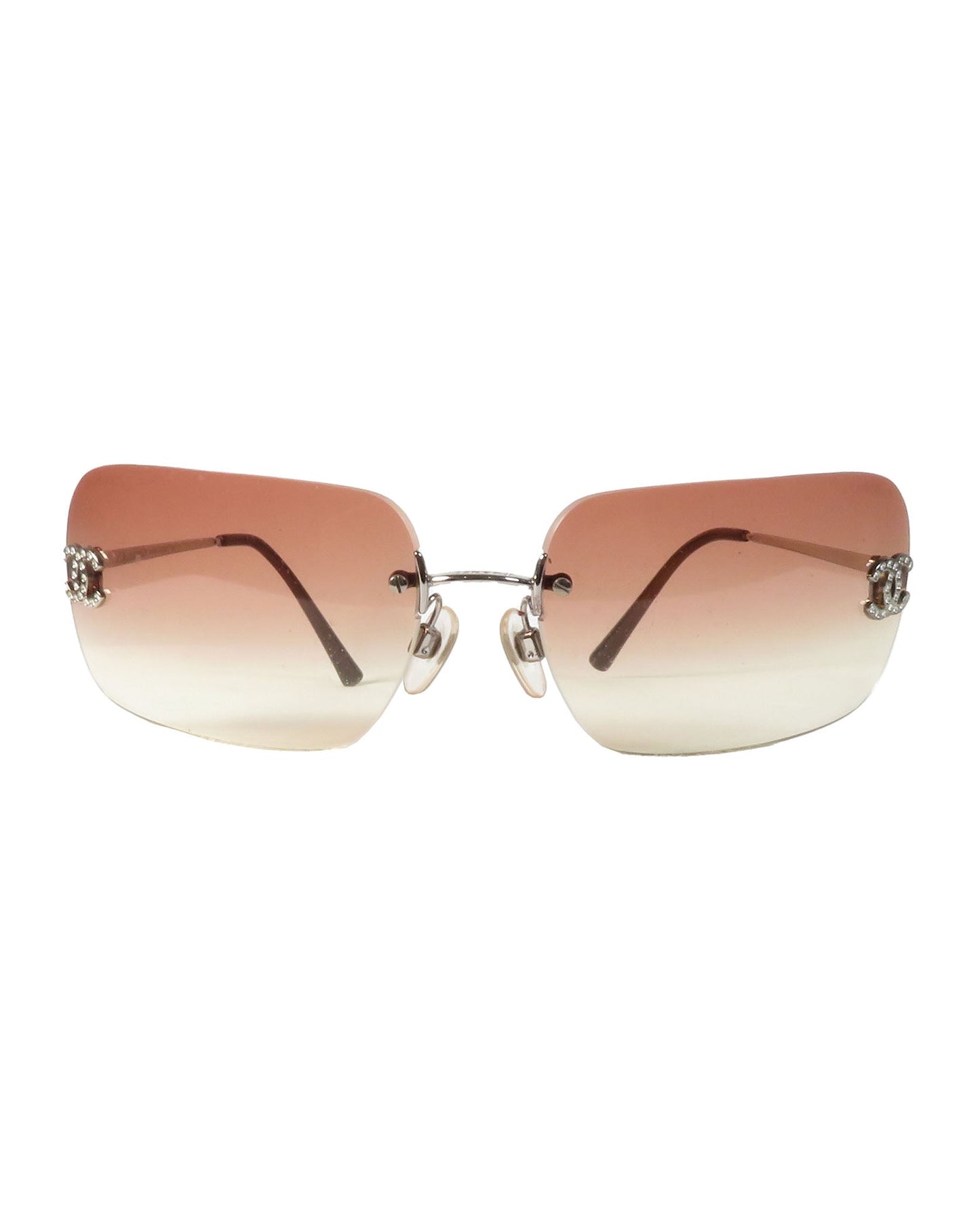 Sunglasses with gradient lenses on a white background