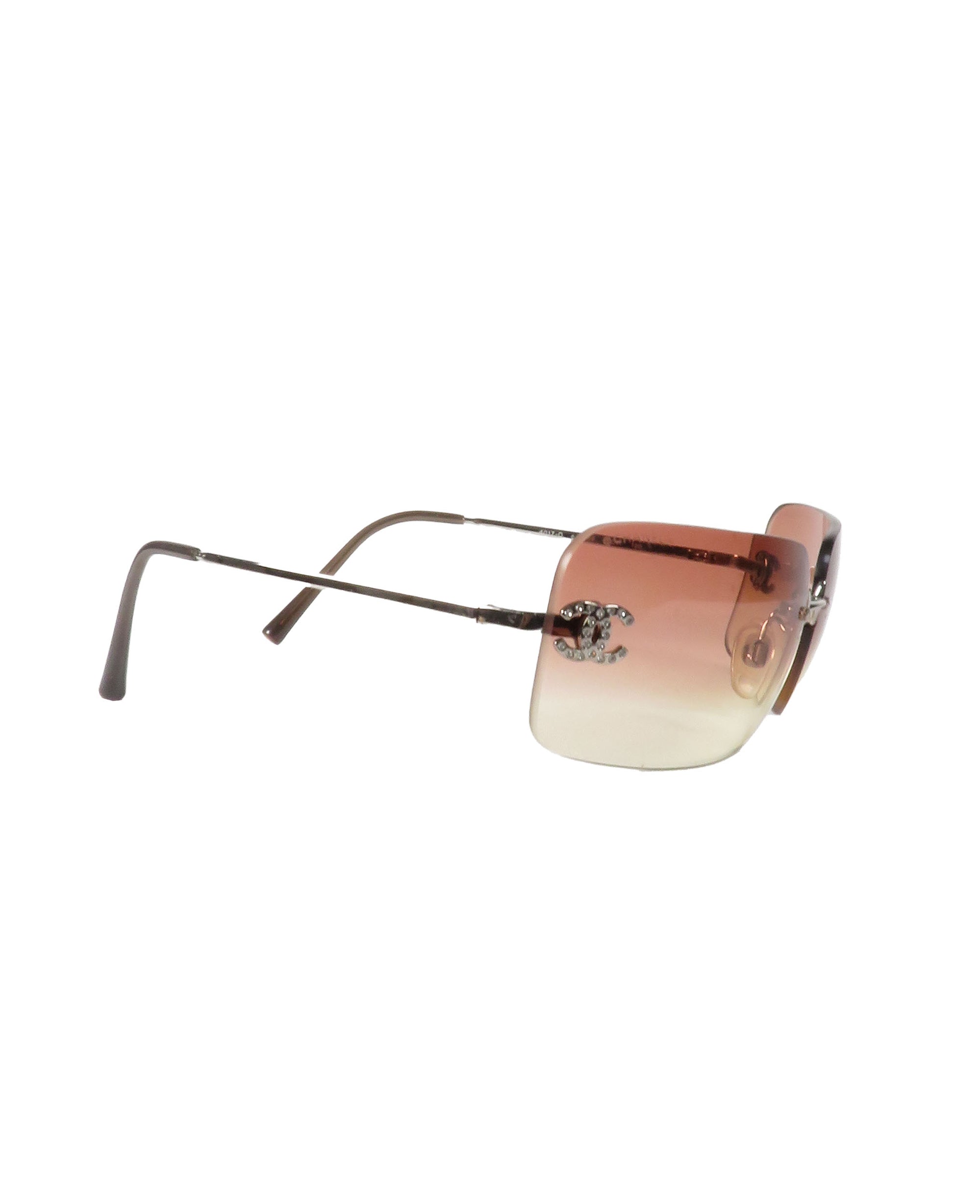 Sunglasses with gradient lenses on a white background