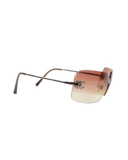Sunglasses with gradient lenses on a white background