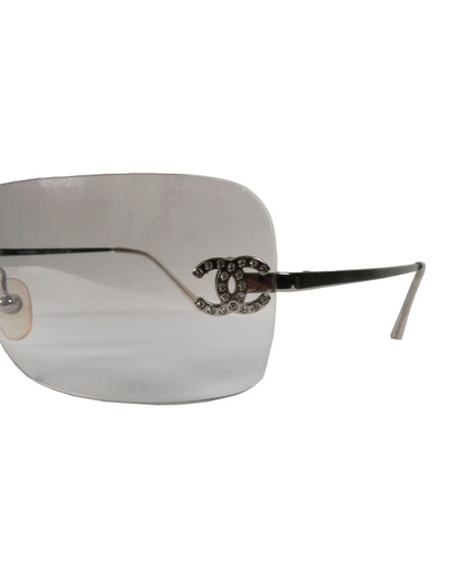 Sunglasses with a brand logo on a white background