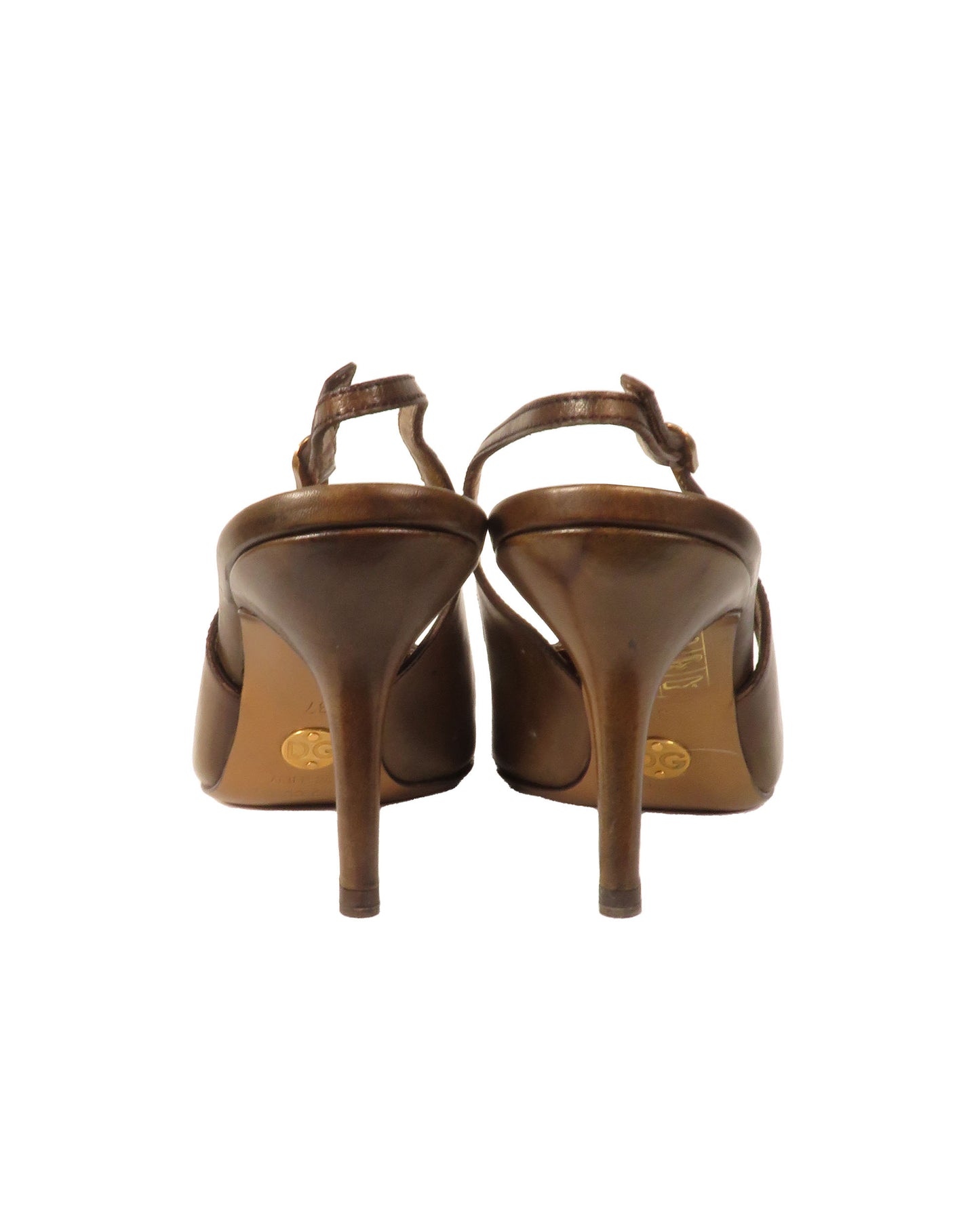 Pair of brown high-heeled shoes on a white background