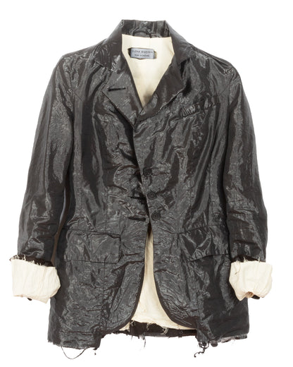 Dark patterned jacket on a mannequin with a white background