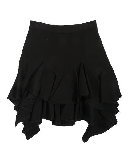 Black ruffled skirt on a white background