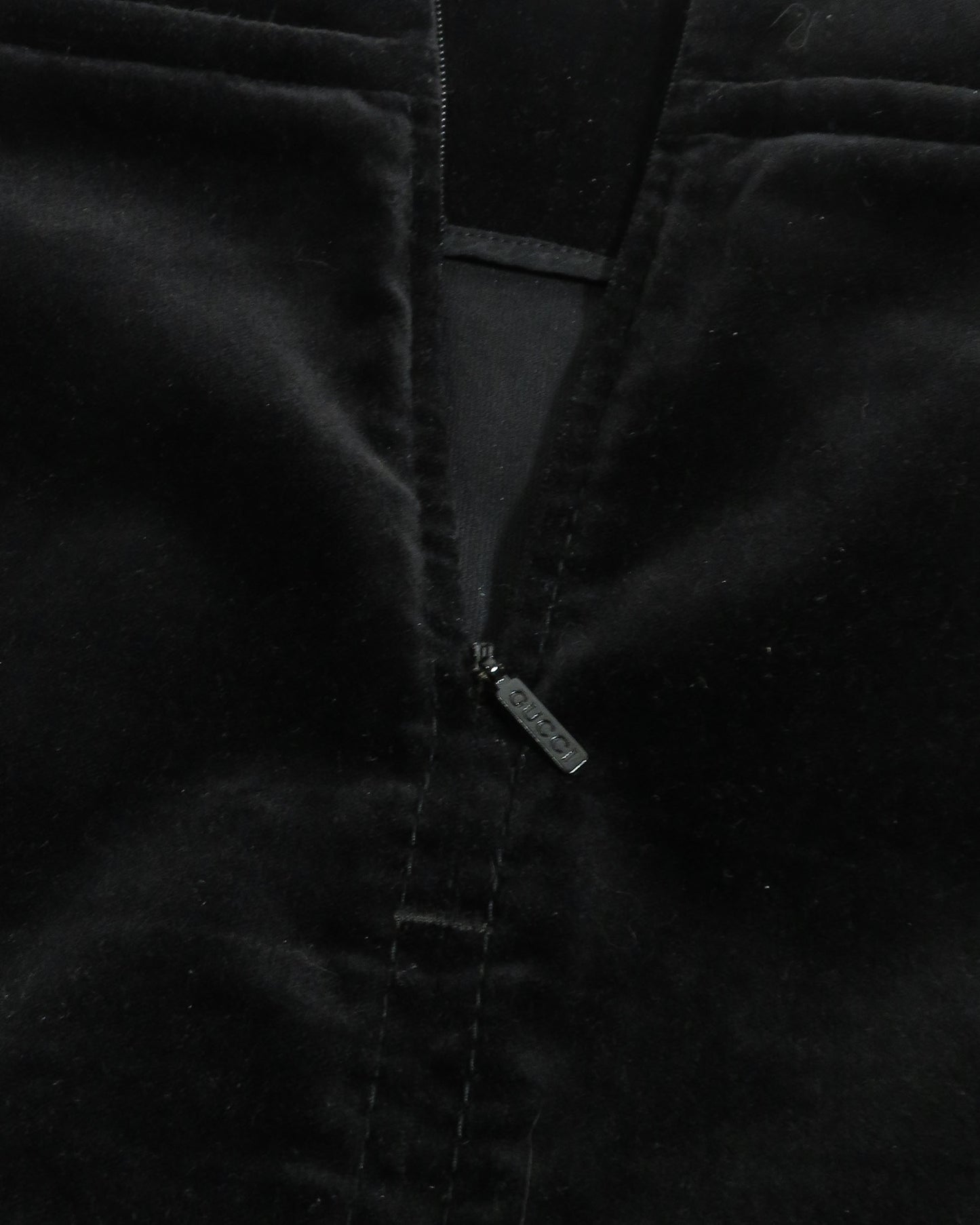 Close-up of a black jacket with a zipper