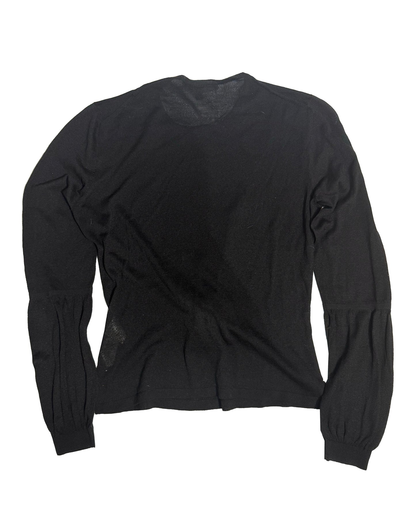 A black long-sleeve knit top with gathered sleeves, laid flat against a white background.