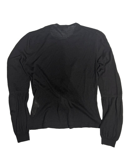 A black long-sleeve knit top with gathered sleeves, laid flat against a white background.