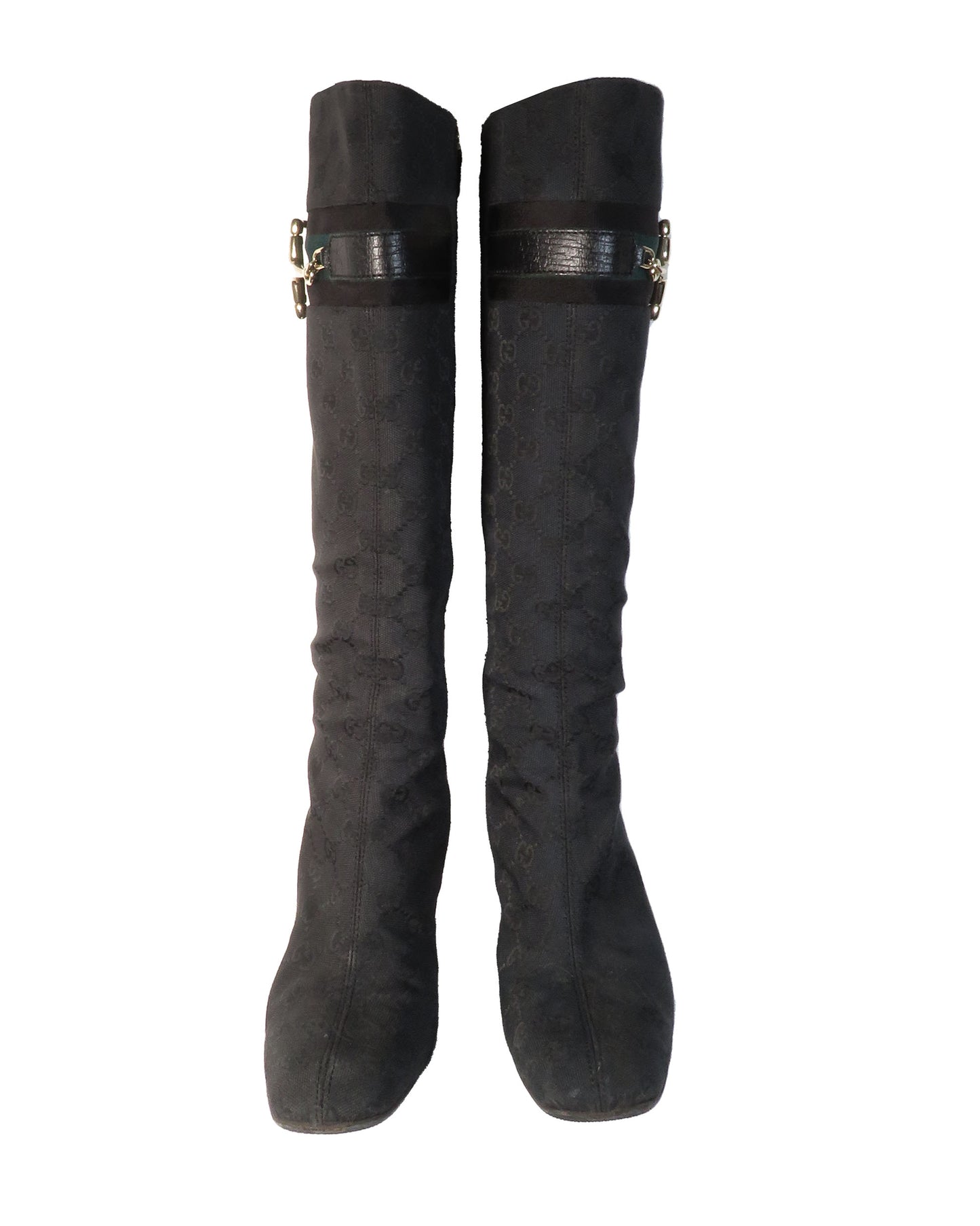 Pair of black knee-high boots on a white background