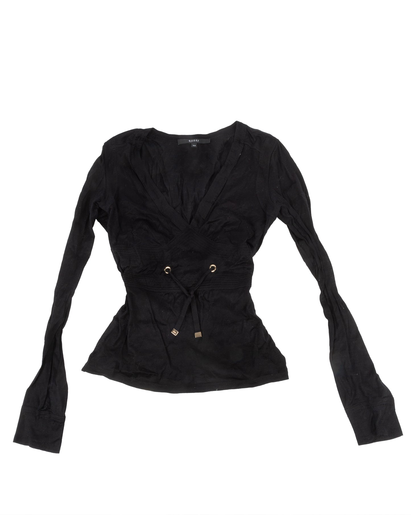 Black long sleeve top with deep V-neckline and gathered bust detailing. An adjustable drawstring waist with metal eyelets and end caps is visible.