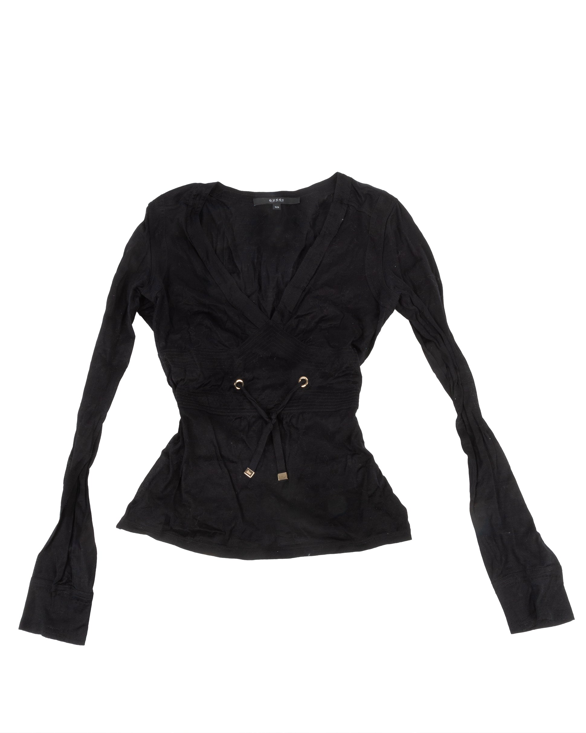 Black long sleeve top with deep V-neckline and gathered bust detailing. An adjustable drawstring waist with metal eyelets and end caps is visible.