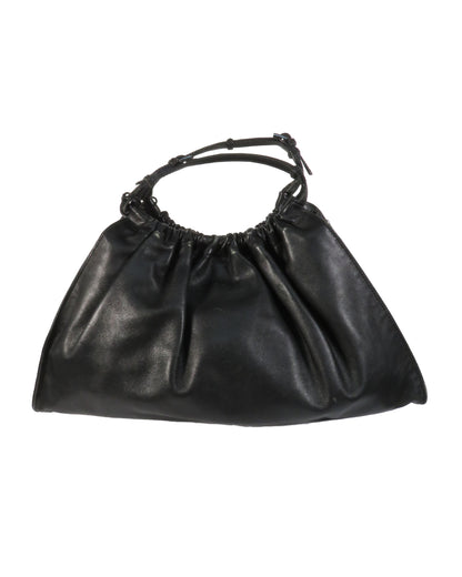 Black leather handbag on a white background