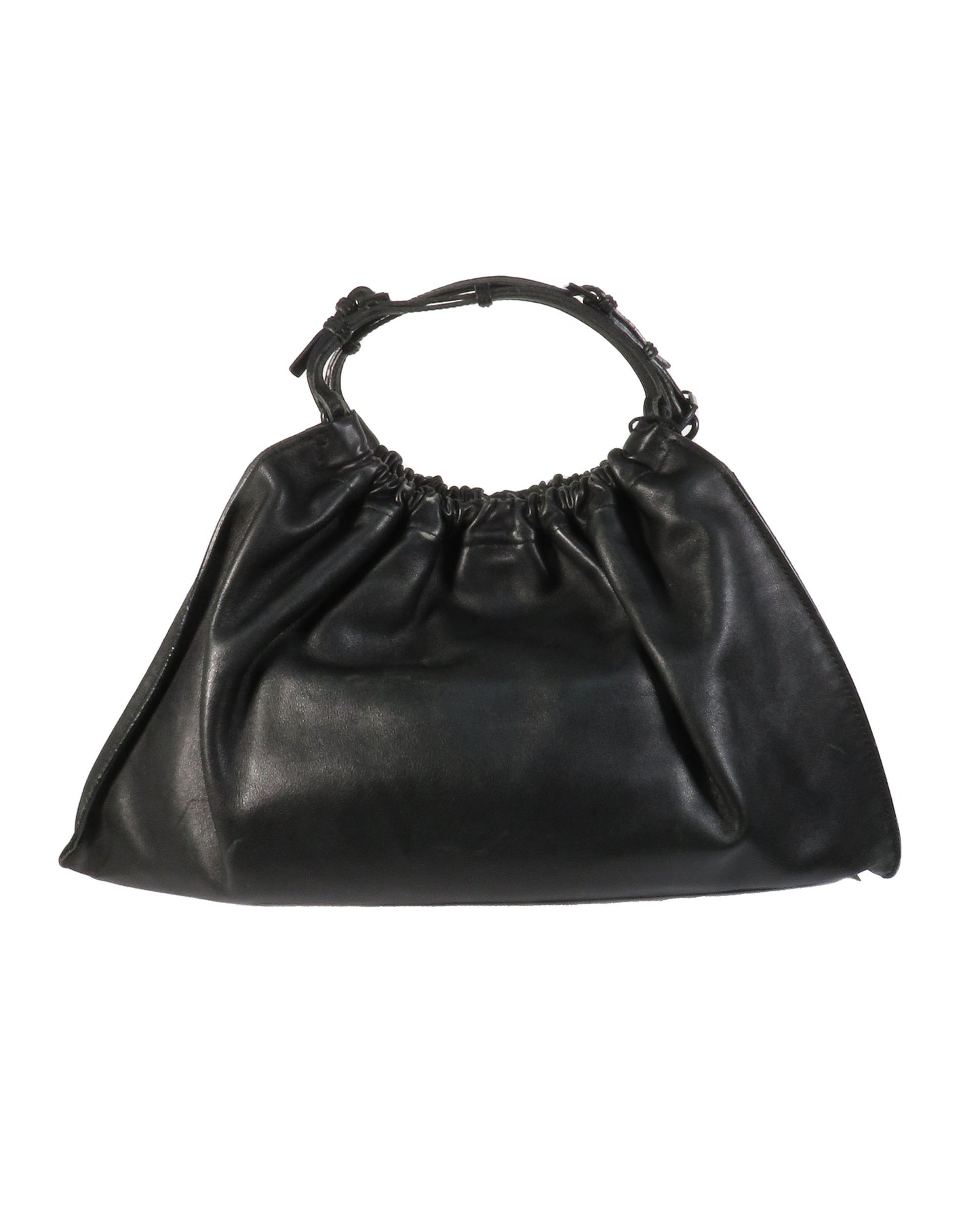 Black leather handbag with bamboo handle design on a white background