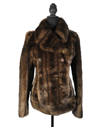 Brown fur jacket on a mannequin against a white background