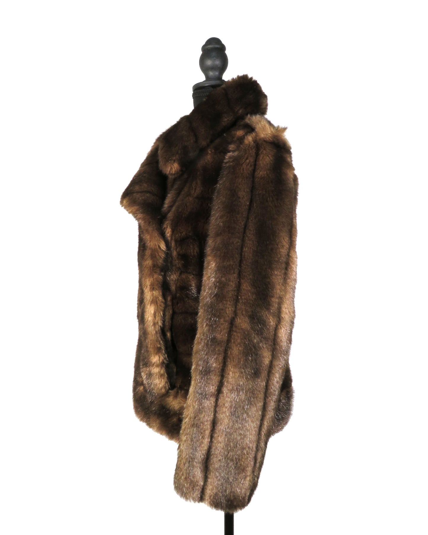 Brown fur coat on a mannequin against a white background