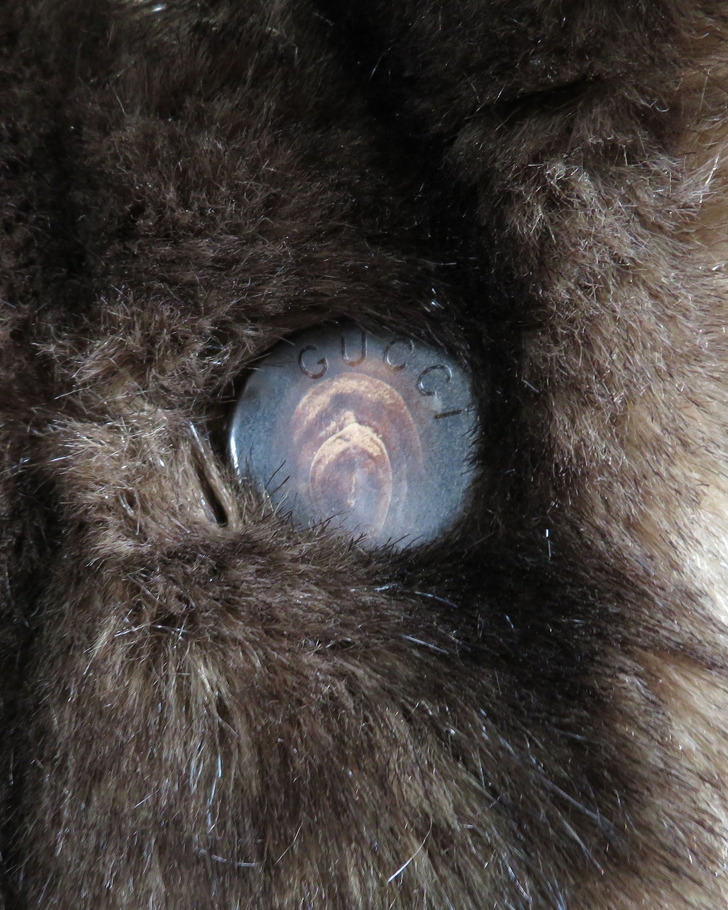 Close-up of a textured surface with a brand logo visible