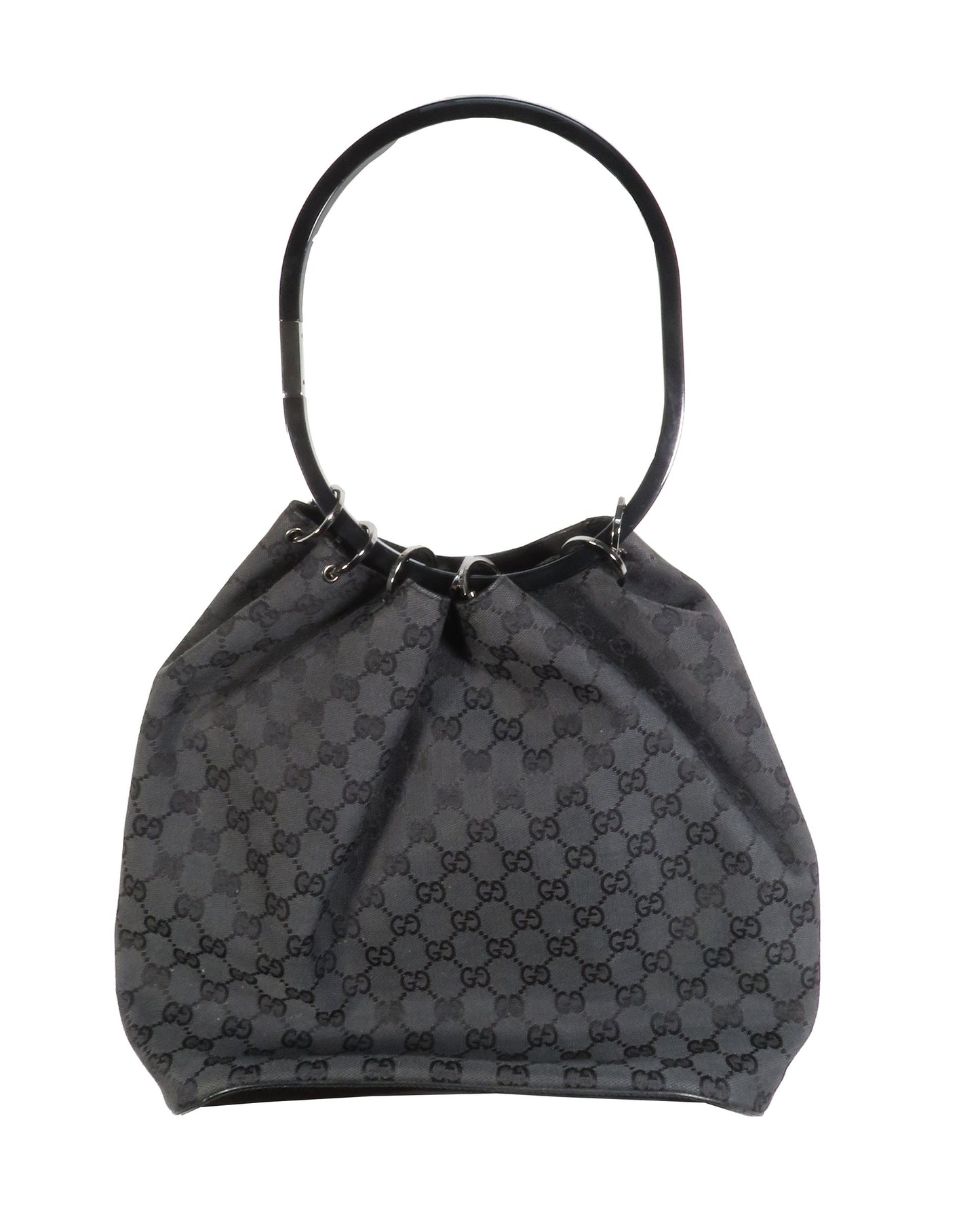 Black handbag with a pattern on a white background