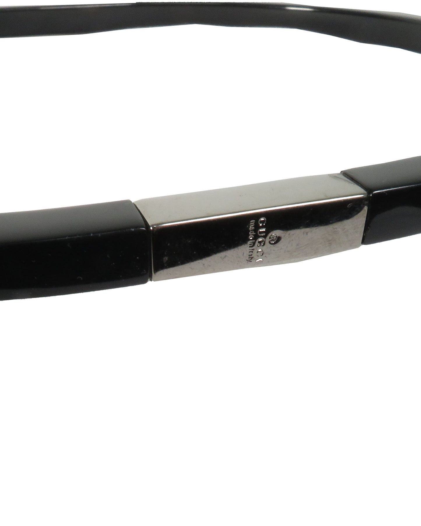 Black and silver eyeglasses on a white background