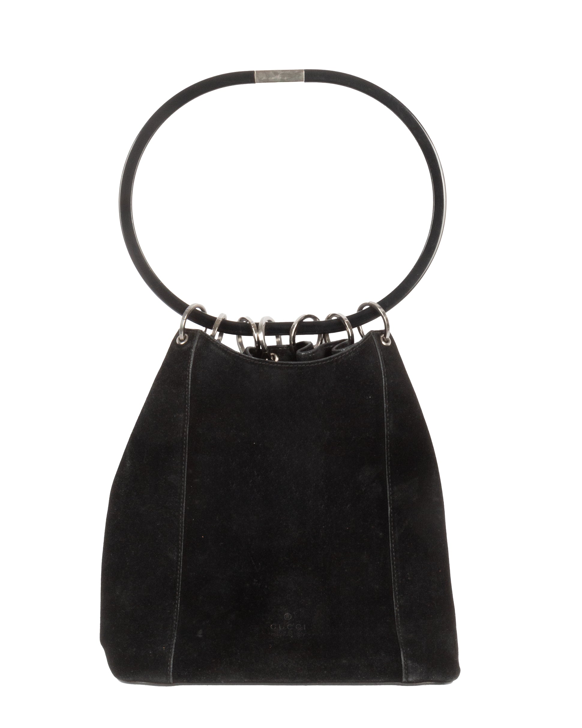 Black suede handbag with oversized black resin ring handle and silver-tone metal rings, with a gathered drape effect. Gucci logo visible on the lower front.