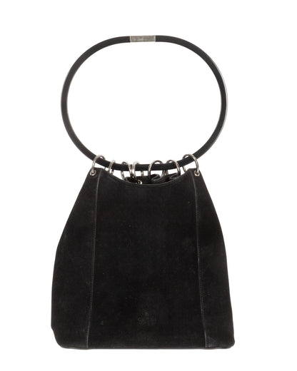 Black suede handbag with oversized black resin ring handle and silver-tone metal rings, with a gathered drape effect. Gucci logo visible on the lower front.