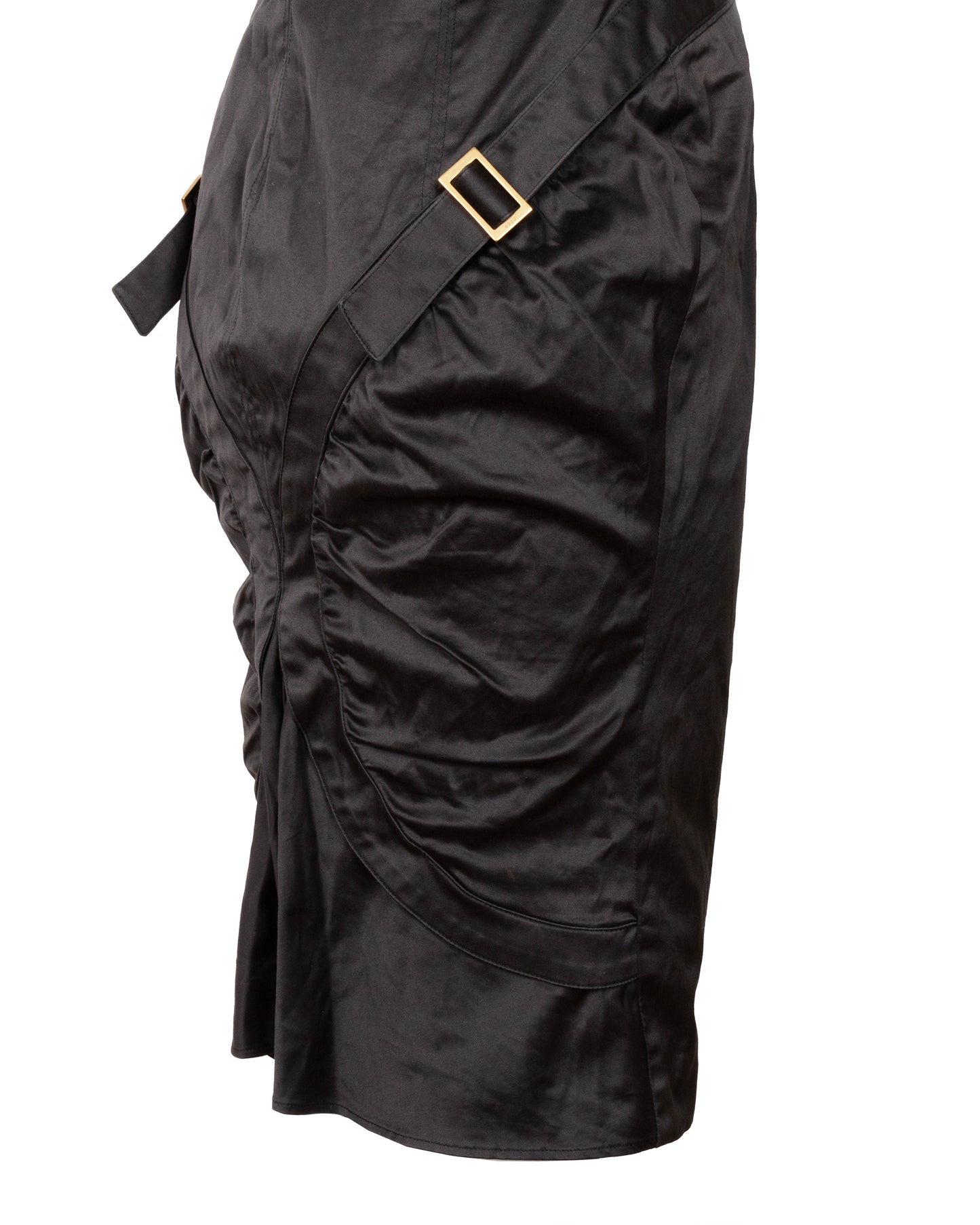 Black skirt with a gold buckle on a white background