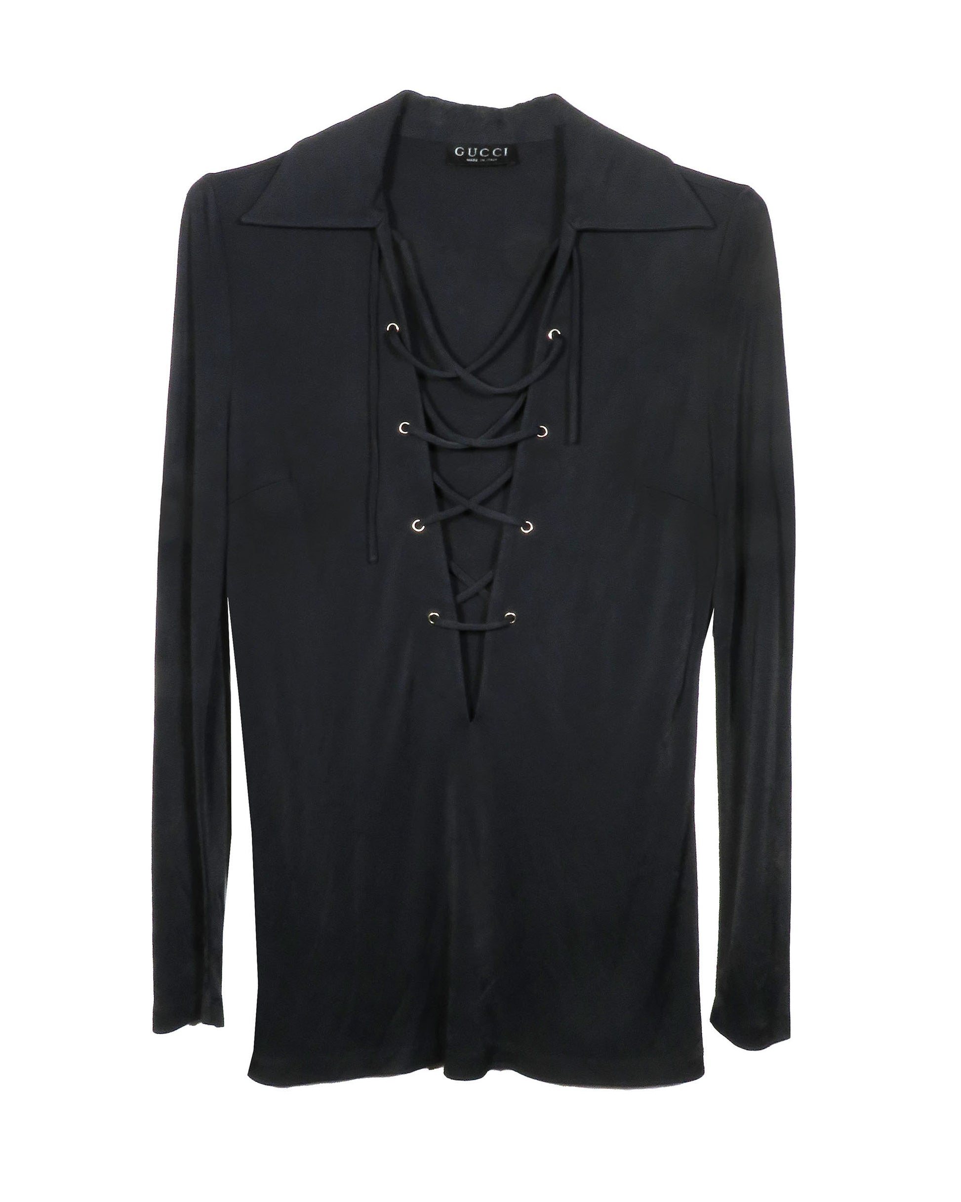 Black long-sleeve top with lace-up details on a white background