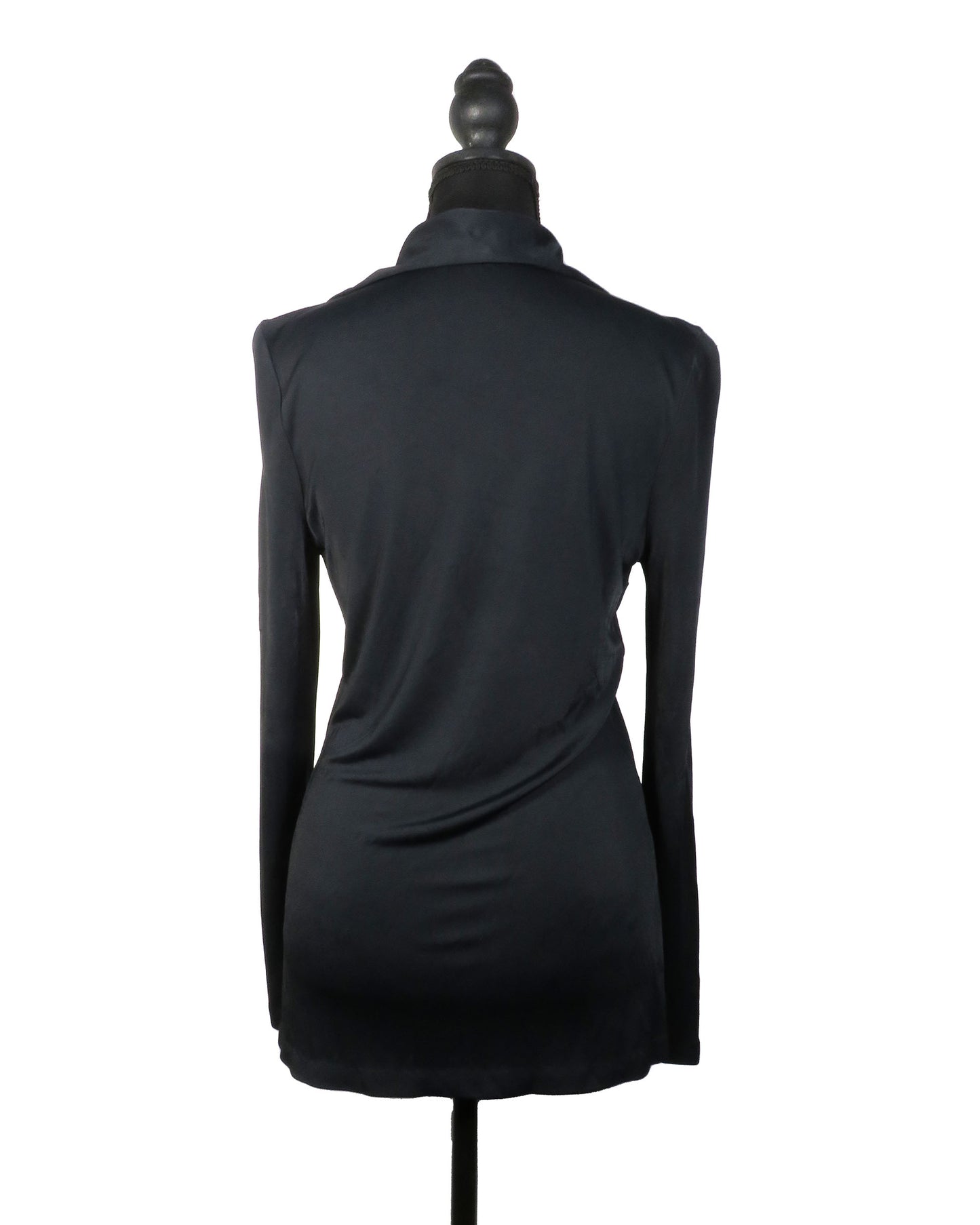 Black long-sleeve top on a mannequin against a white background