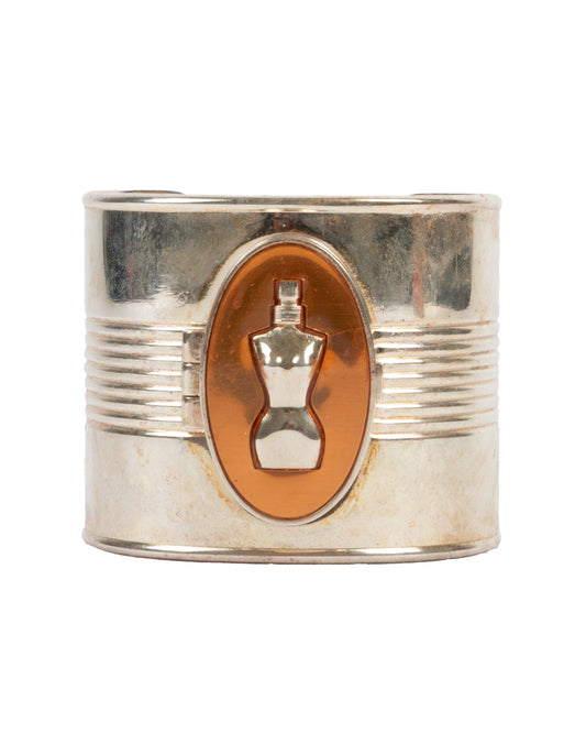 Jean Paul Gaultier Classique Bust Cuff Bangle with a central emblem on a white background