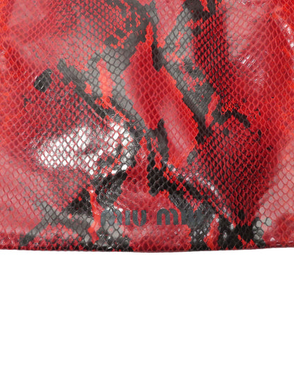 Red and black patterned fabric with 'mu mu' branding.