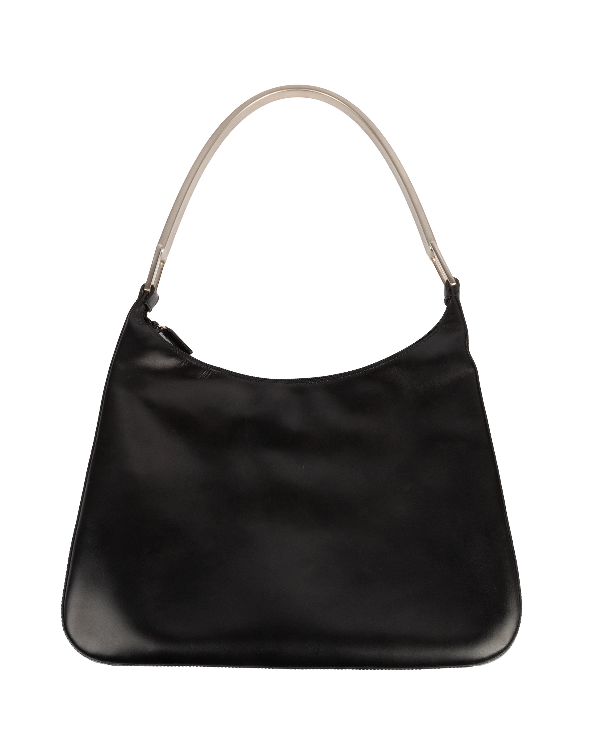 A black leather shoulder bag with a silver-tone metal handle, from Prada's Fall/Winter 1998 collection.