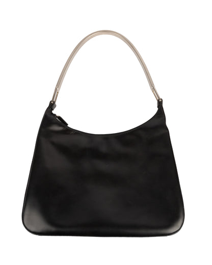 A black leather shoulder bag with a silver-tone metal handle, from Prada's Fall/Winter 1998 collection.