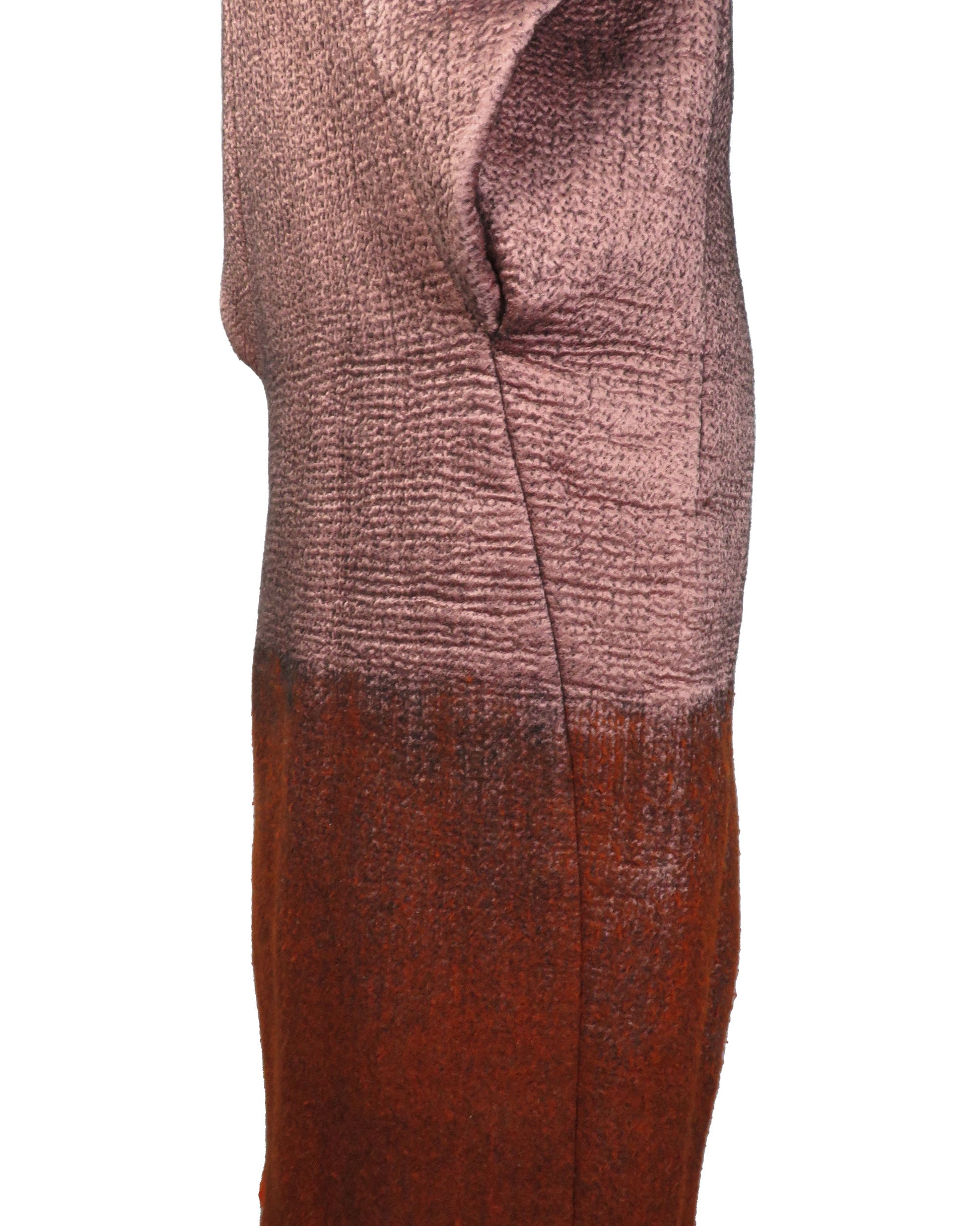 Textured fabric swatch with gradient color from pink to brown on a white background