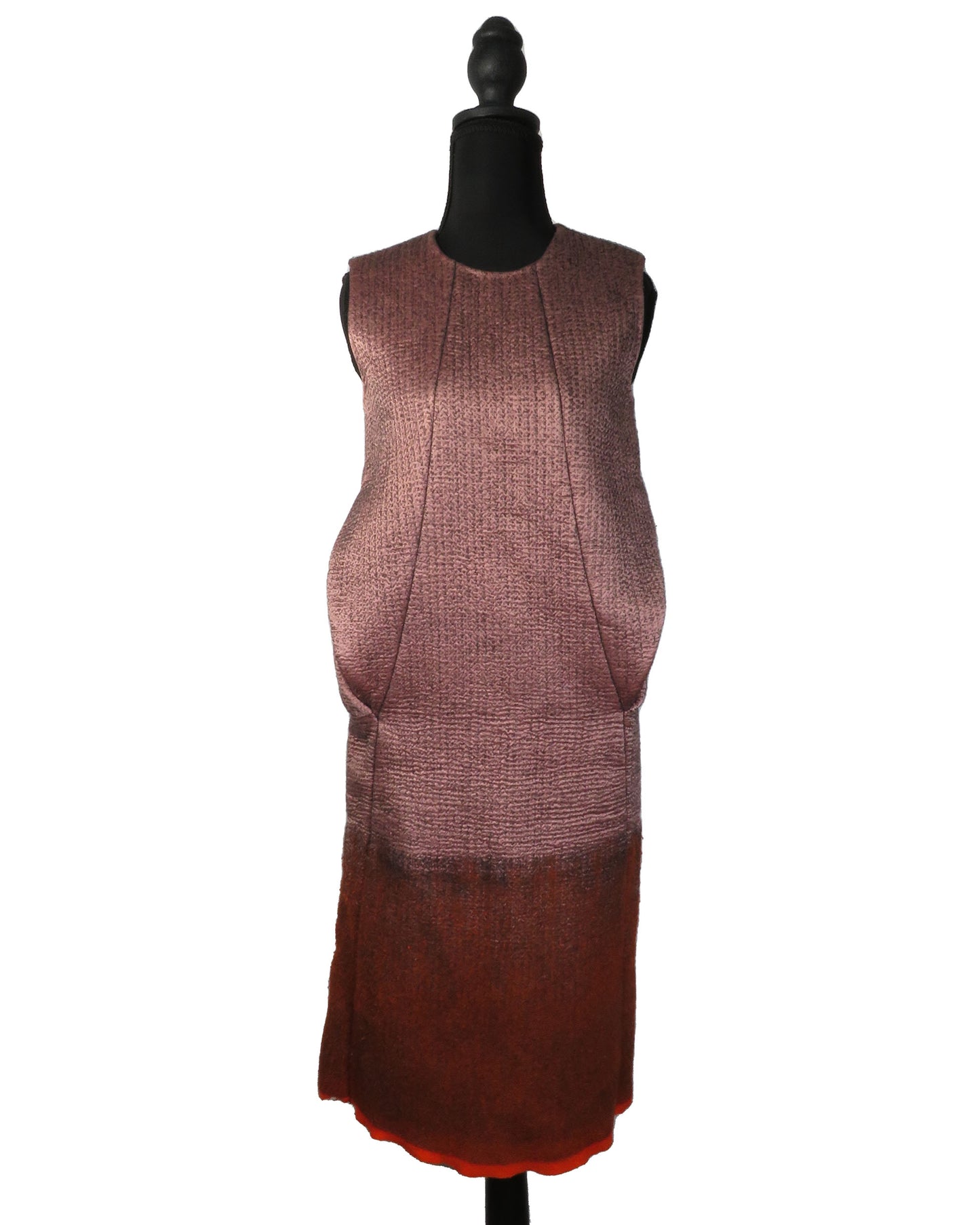 Brown dress on a mannequin against a white background