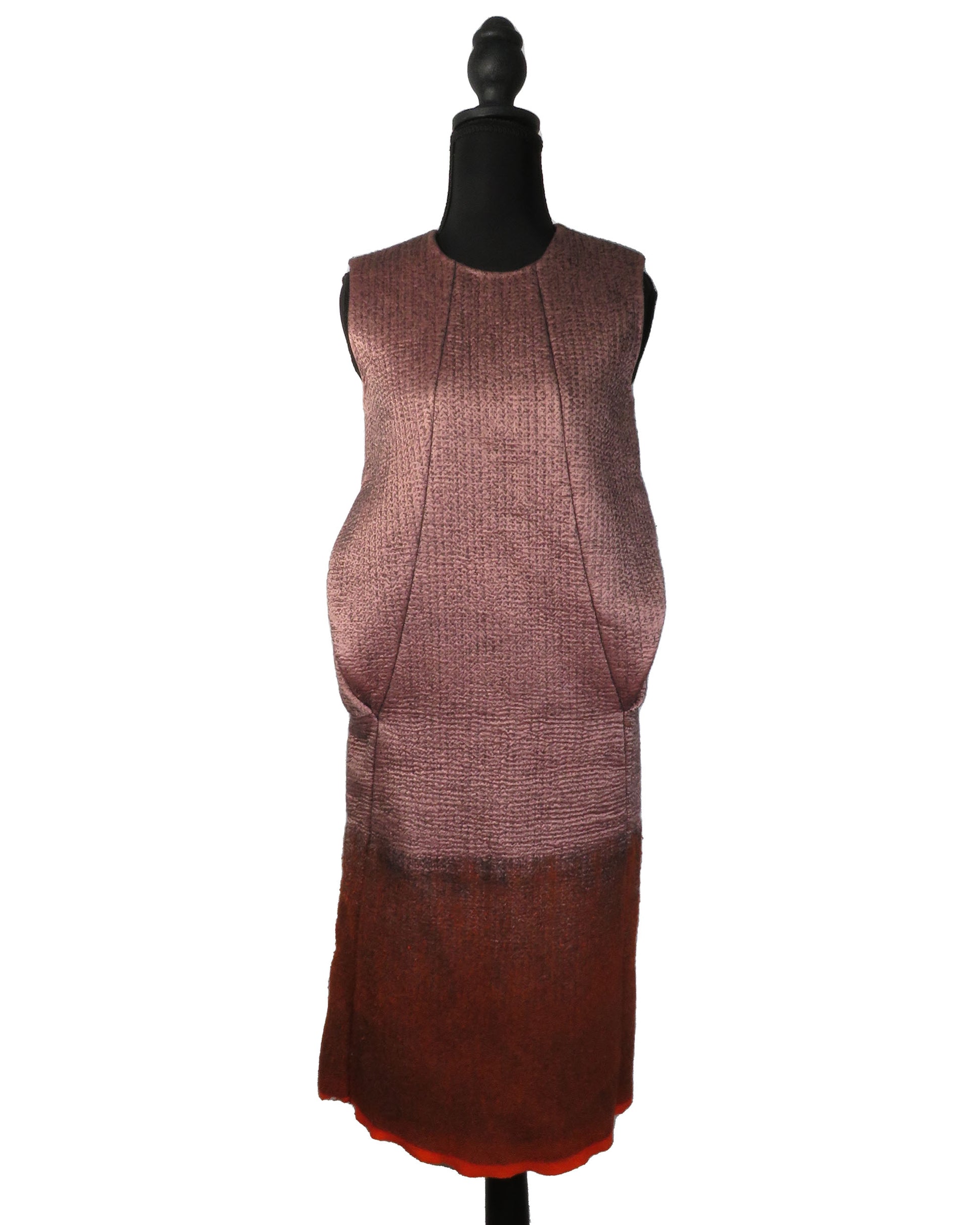 Brown dress on a mannequin against a white background