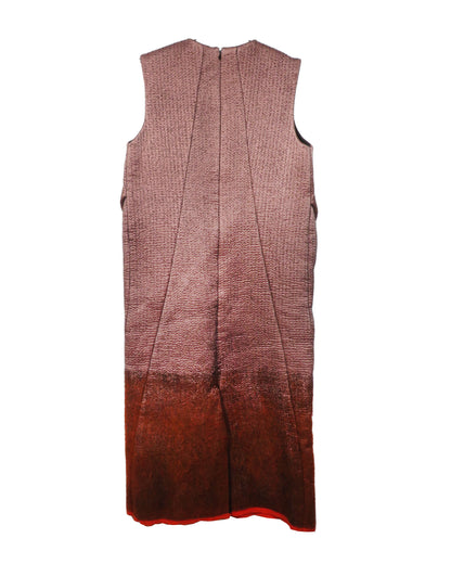 Long sleeveless dress with gradient pattern on a white background