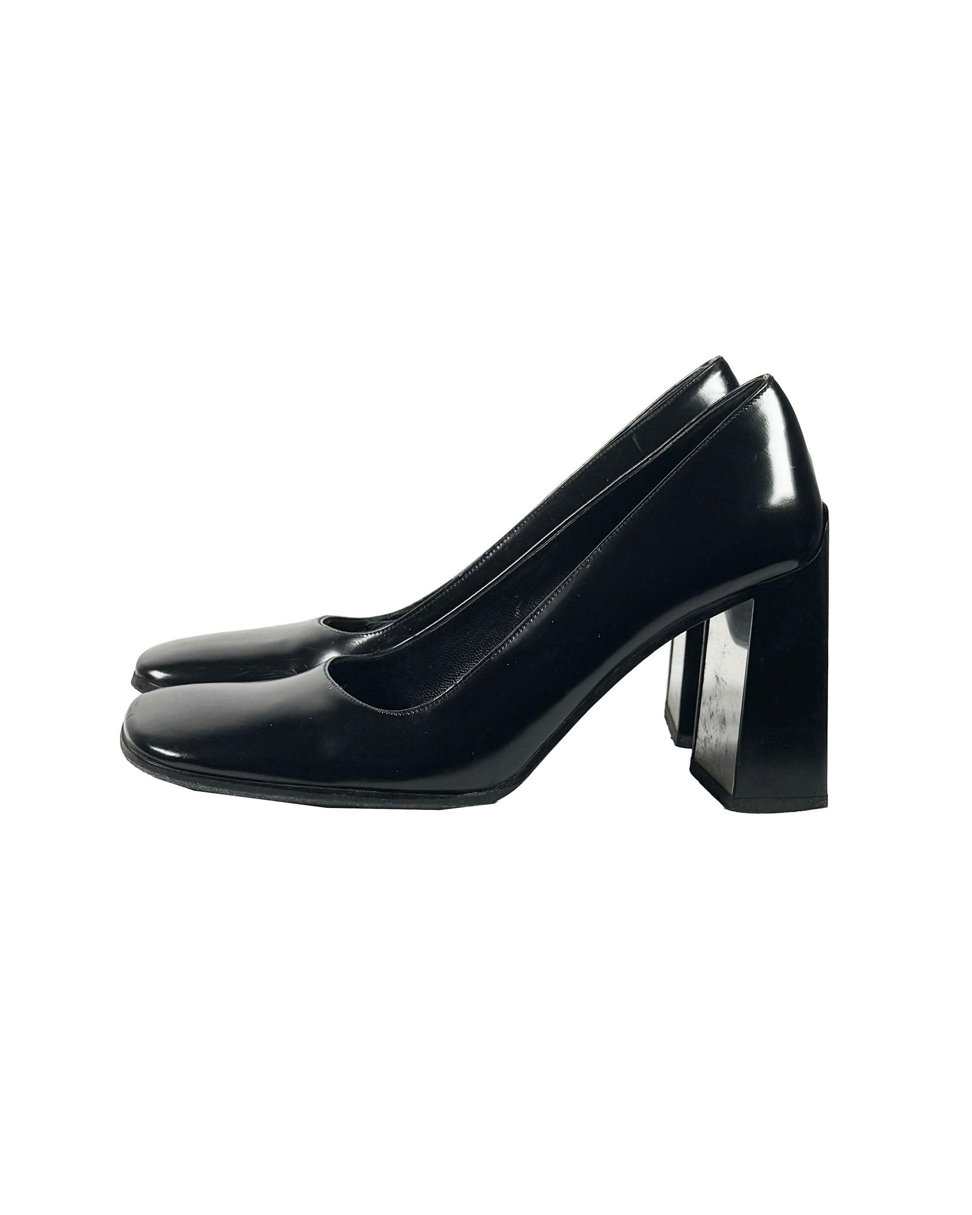 Black high-heeled shoes on a white background
