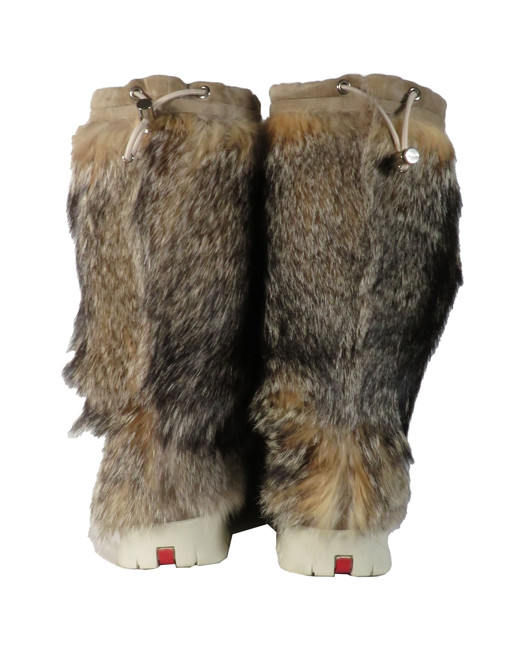 Pair of fur-trimmed boots on a white background