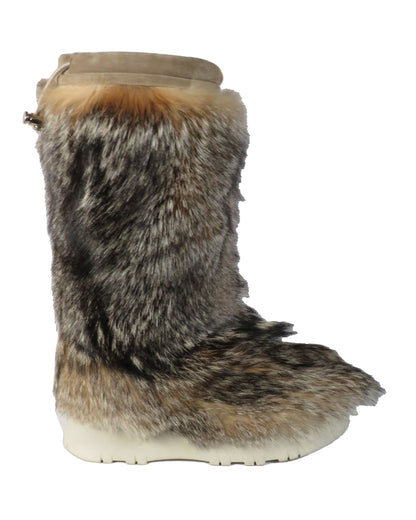 Fur boot with a white sole on a white background