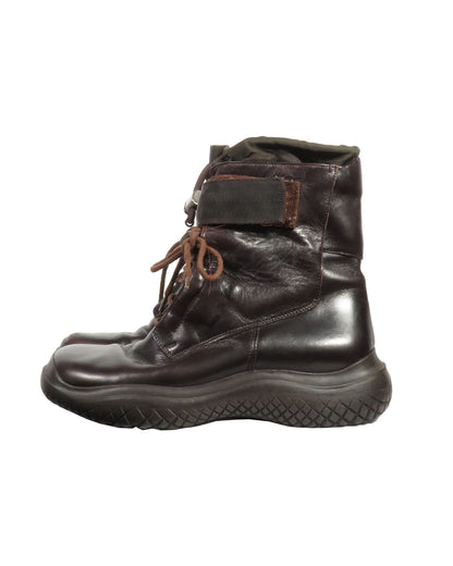 Brown leather boot on a white background