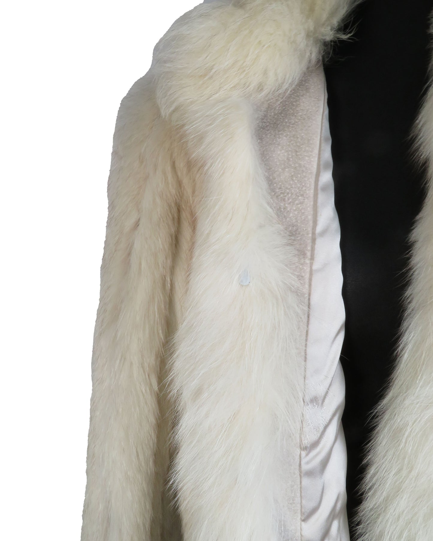 Close-up of a fur coat with a white fur collar on a white background