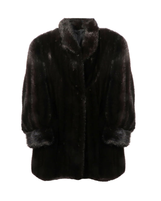 Black fur coat on a white background