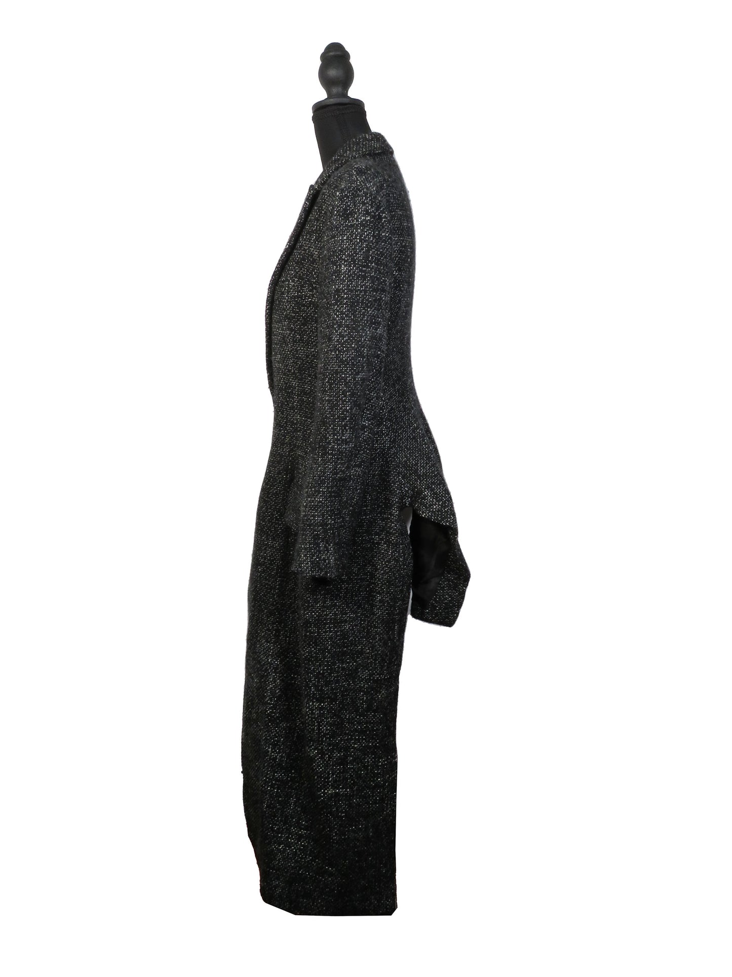 Black textured coat on a mannequin against a white background