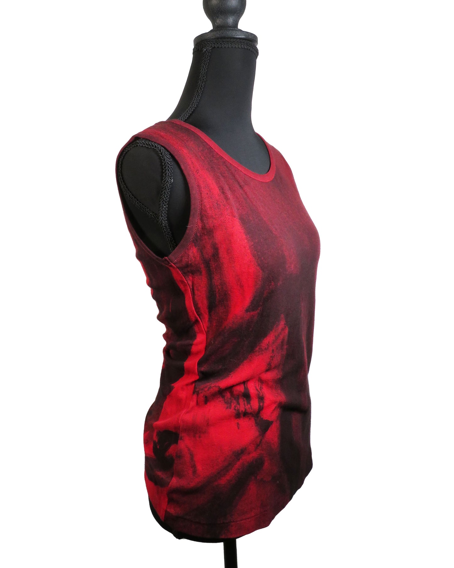 Red tank top on a mannequin against a white background