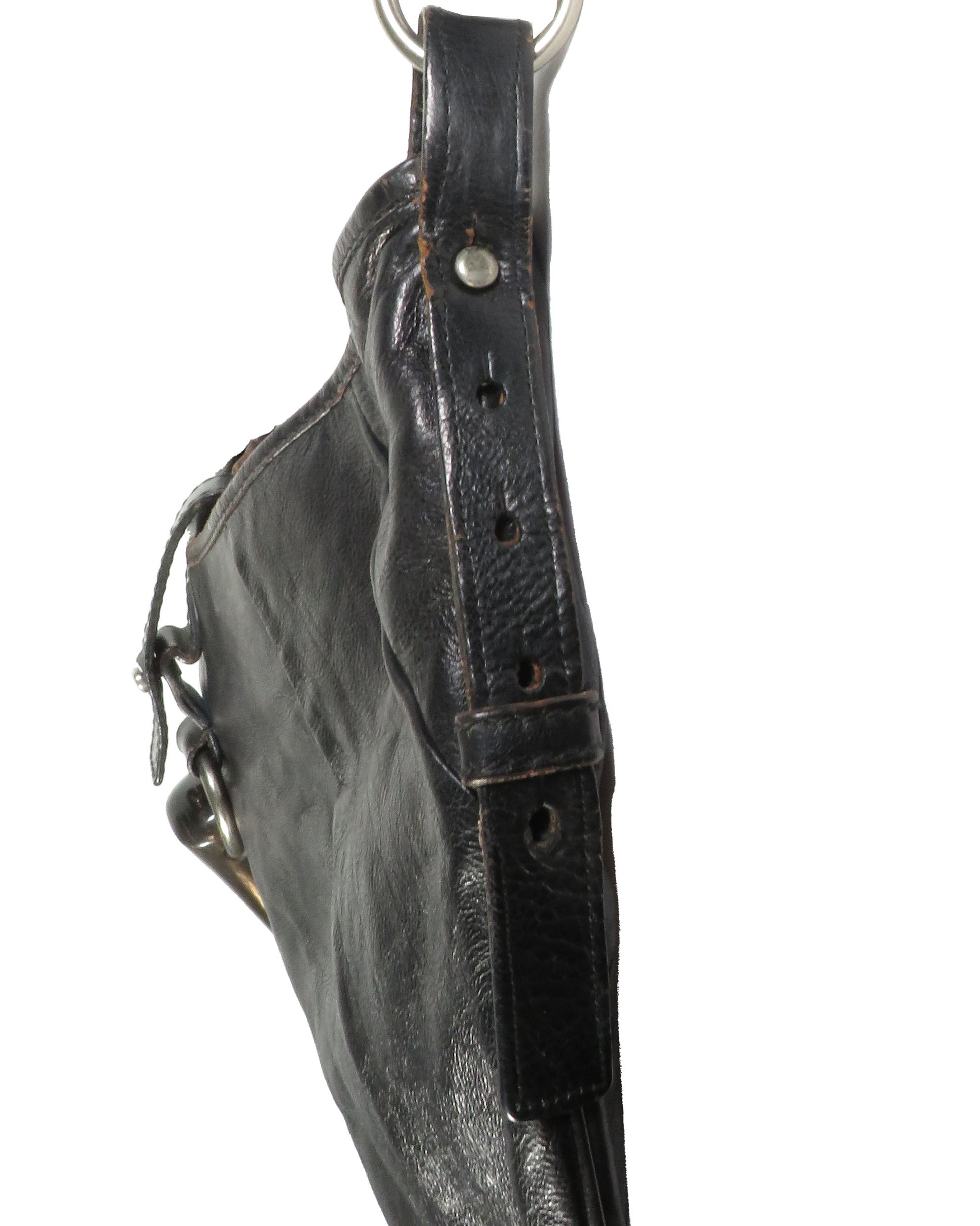 Black leather bag with a strap on a white background